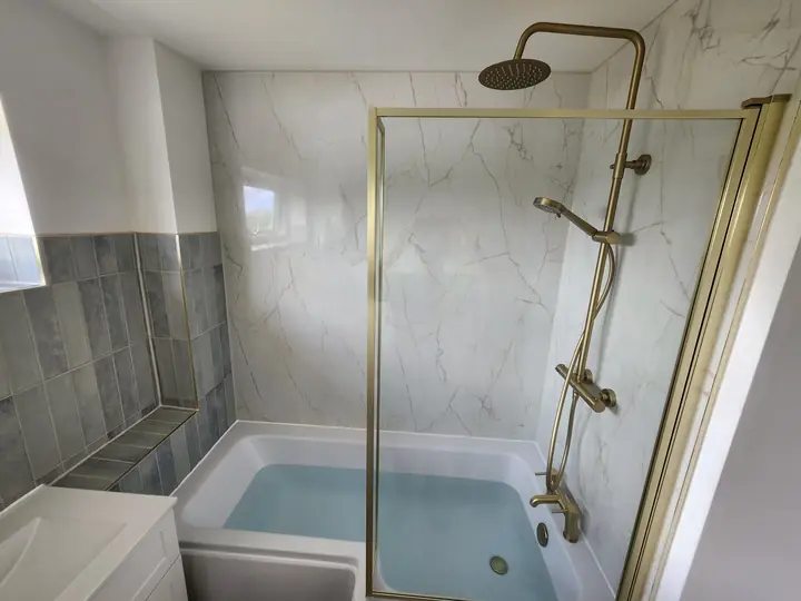 Blue and brass family bathroom