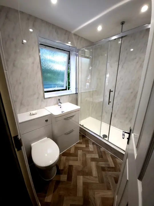 Shower room with herringbone floor