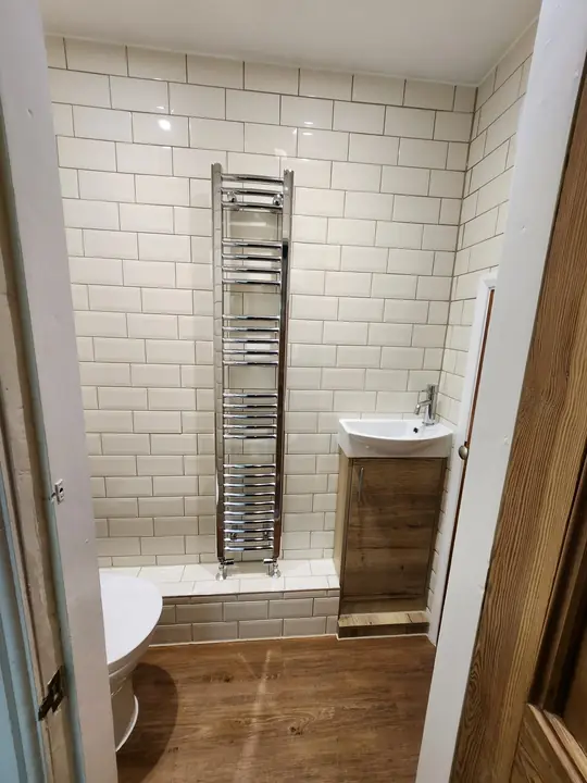 Metro-tiled cloakroom