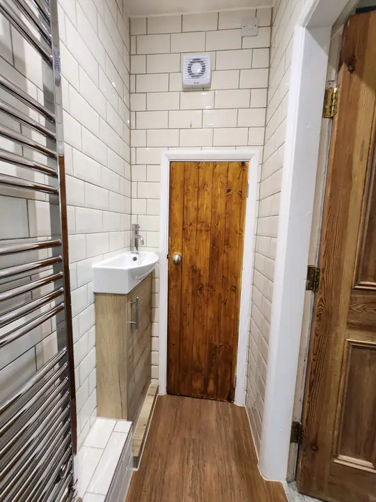 Metro-tiled cloakroom